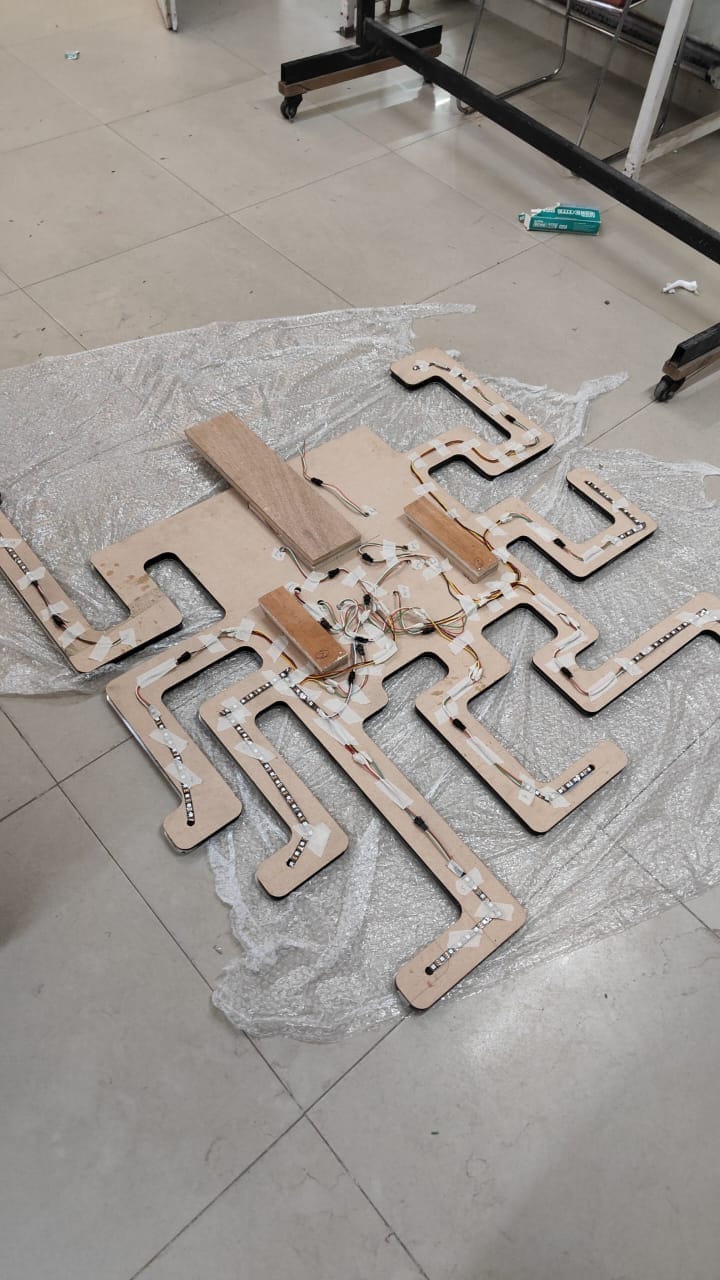 Reverse side of the branching hair component with LED strips and wiring in progress
